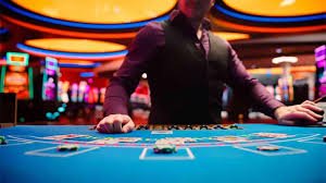 Antarmuka aplikasi mobile kuda jitu menampilkan pasar Liga 1 dan live-dealer tables